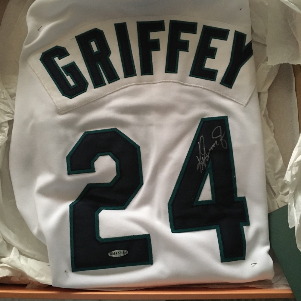 Signed Seattle mariners ken Griffey Junior jersey. Authenticated by upper deck.
